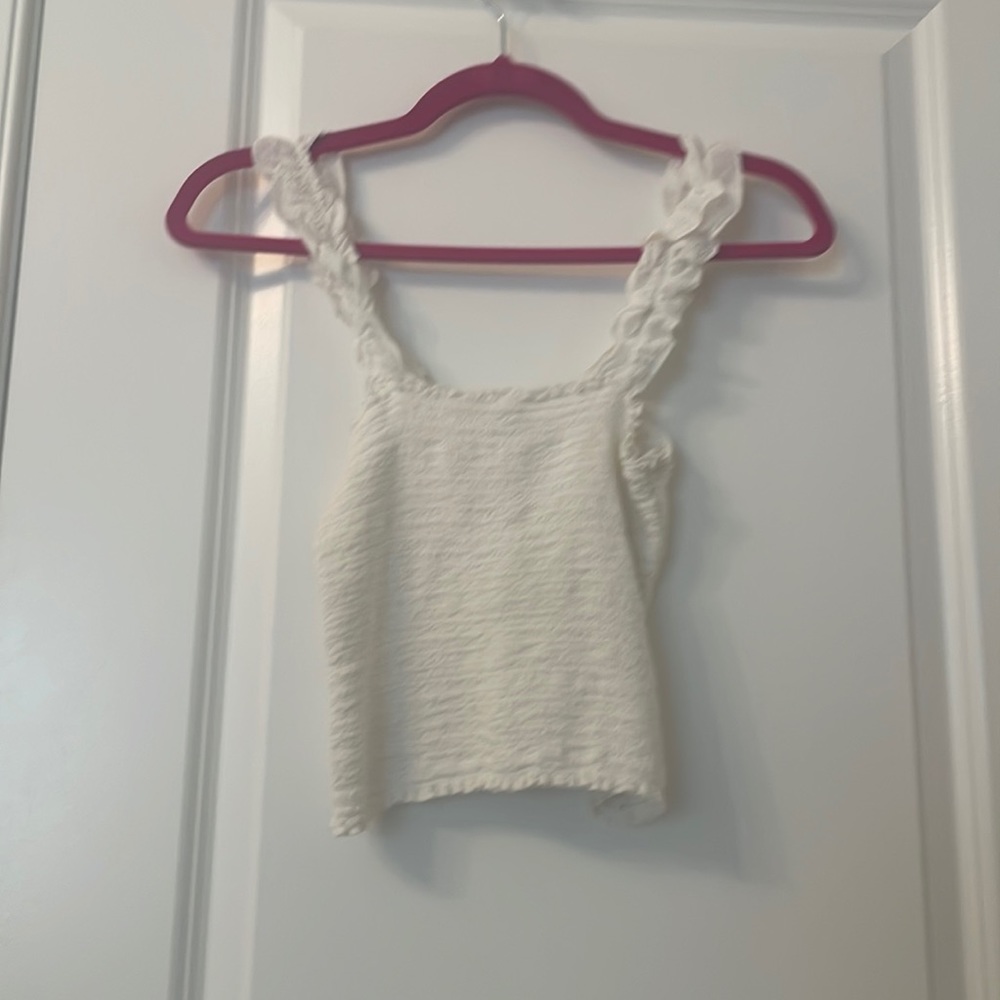 White ruffled tank top